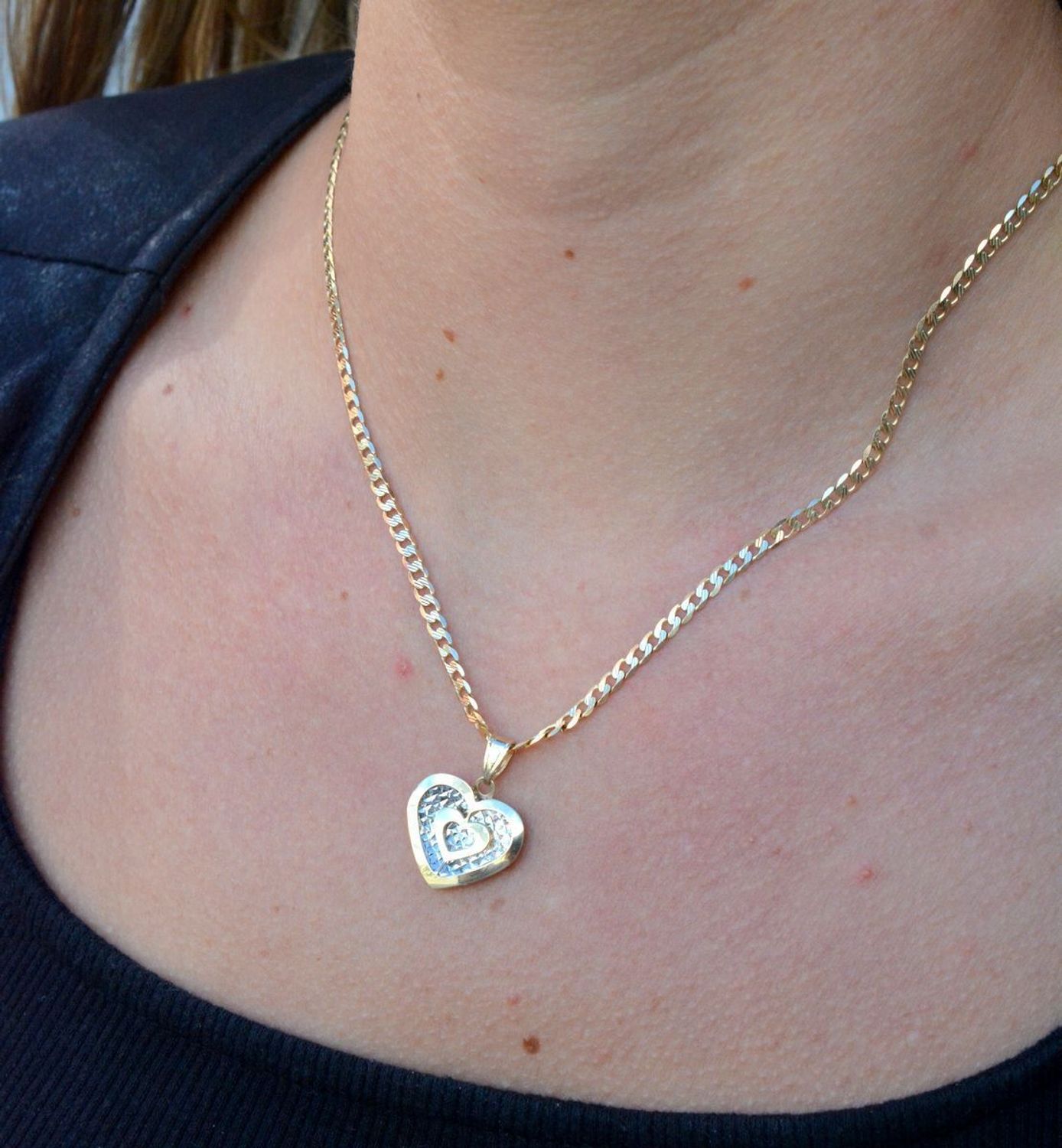 Złota zawieszka błyszczące serce próba 333 ZA 4216 333. . Piękna złota zawieszka w kształcie serca to śliczny dodatek, który odmieni każdą stylizację. Na prezent.jpg